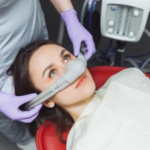 Dental patient undergoing sedation dentistry in Garden City during treatment